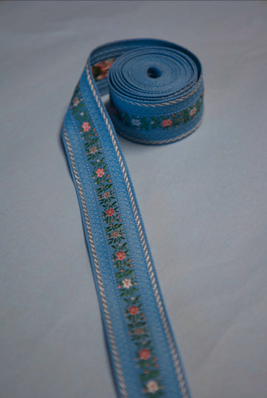 Jacquardbånd blomstret 25 mm Lysblå