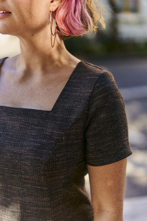 Dressing med ermer